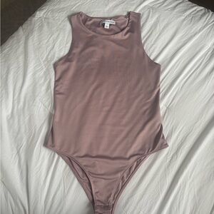 And Now This Body Suit